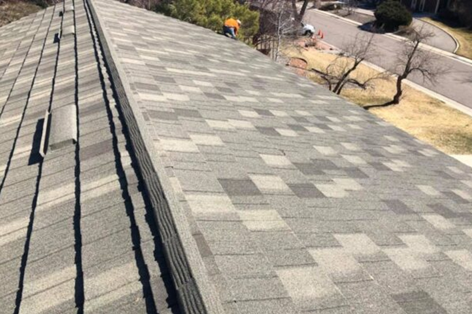 Roof repair crew working on a Littleton, Colorado home